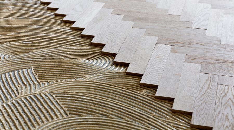 Colles pour la pose d’un parquet sur un chauffage par le sol